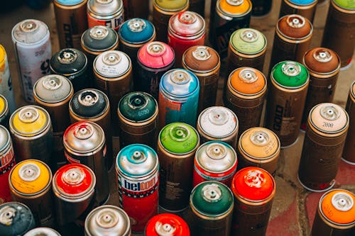 Free Colorful Cans of Spray Paints Stock Photo