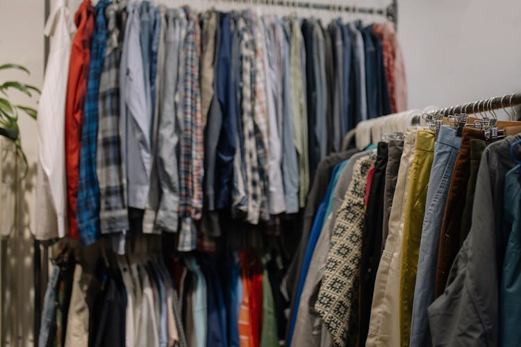 Assorted Clothes Hanged On A Clothes Rack