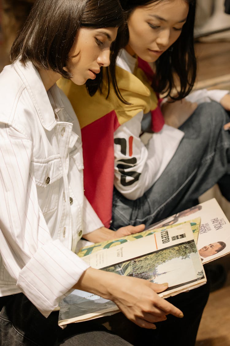 Women Looking At Vintage Vinyl Records