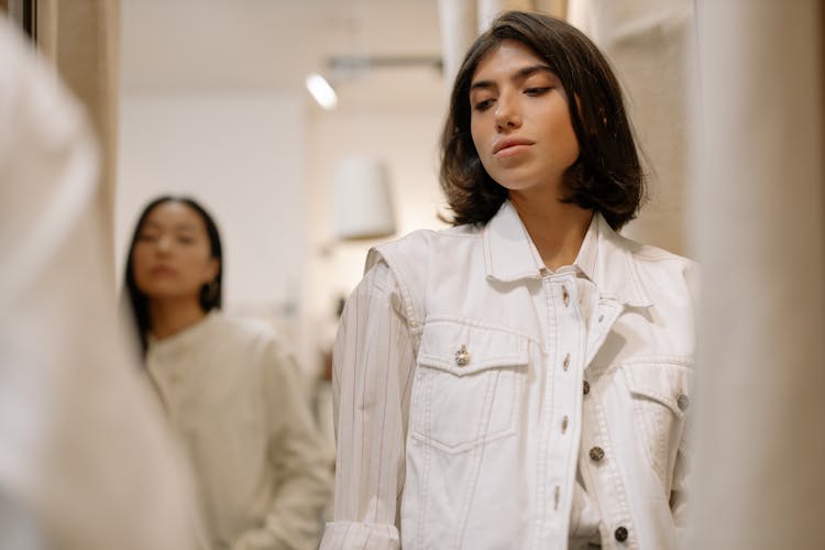 Woman In White Button Up Vest