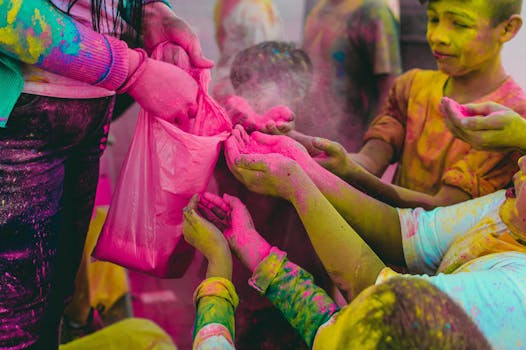 Children joyfully playing with colorful powder during a Holi celebration, symbolizing the festival's spirit.