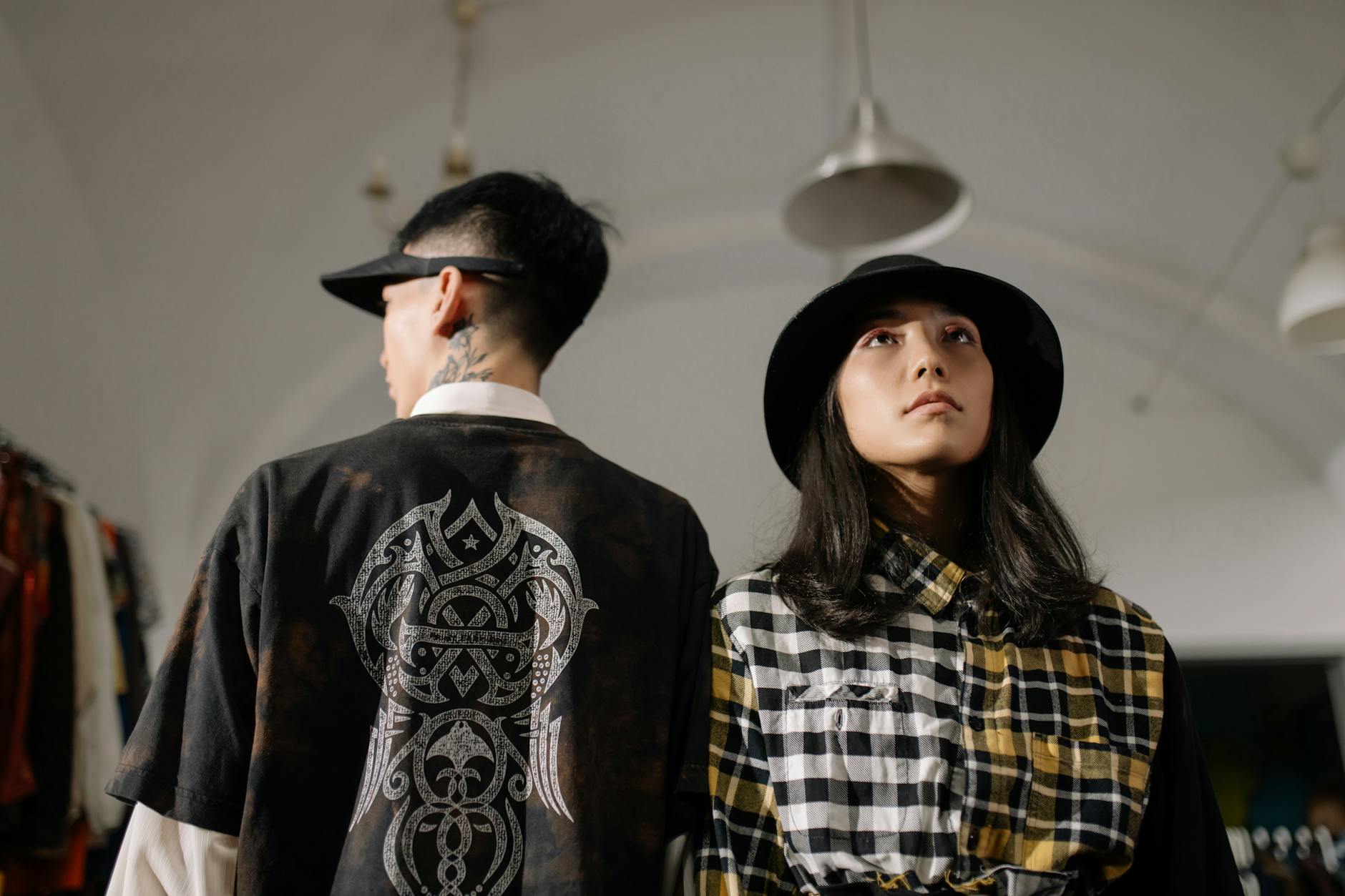 Man and Woman Wearing Black Hat