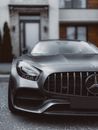 Silver Mercedes Benz Car in Front of White Building