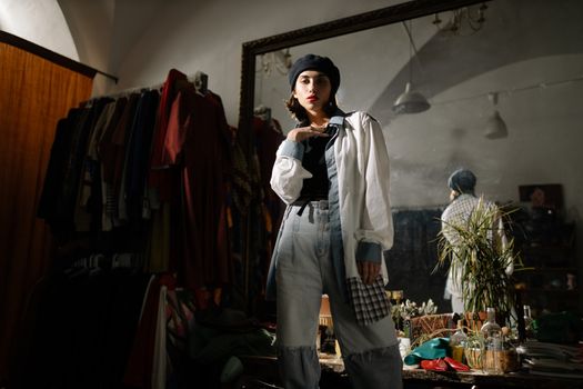 A Woman in White Long Sleeve Shirt Looking at the Camera