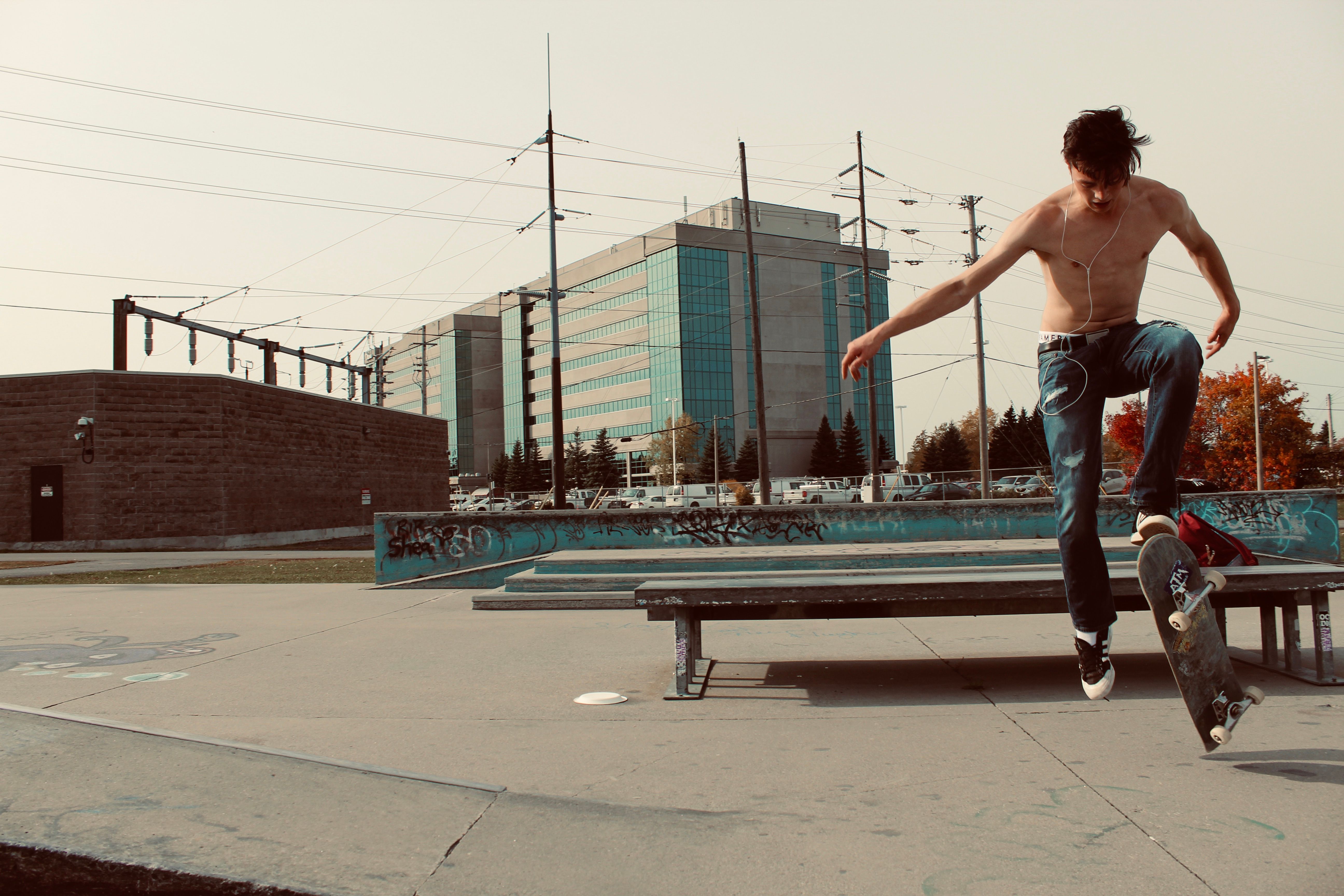 Man Sliding on Metal Railing using Skateboard · Free Stock Photo