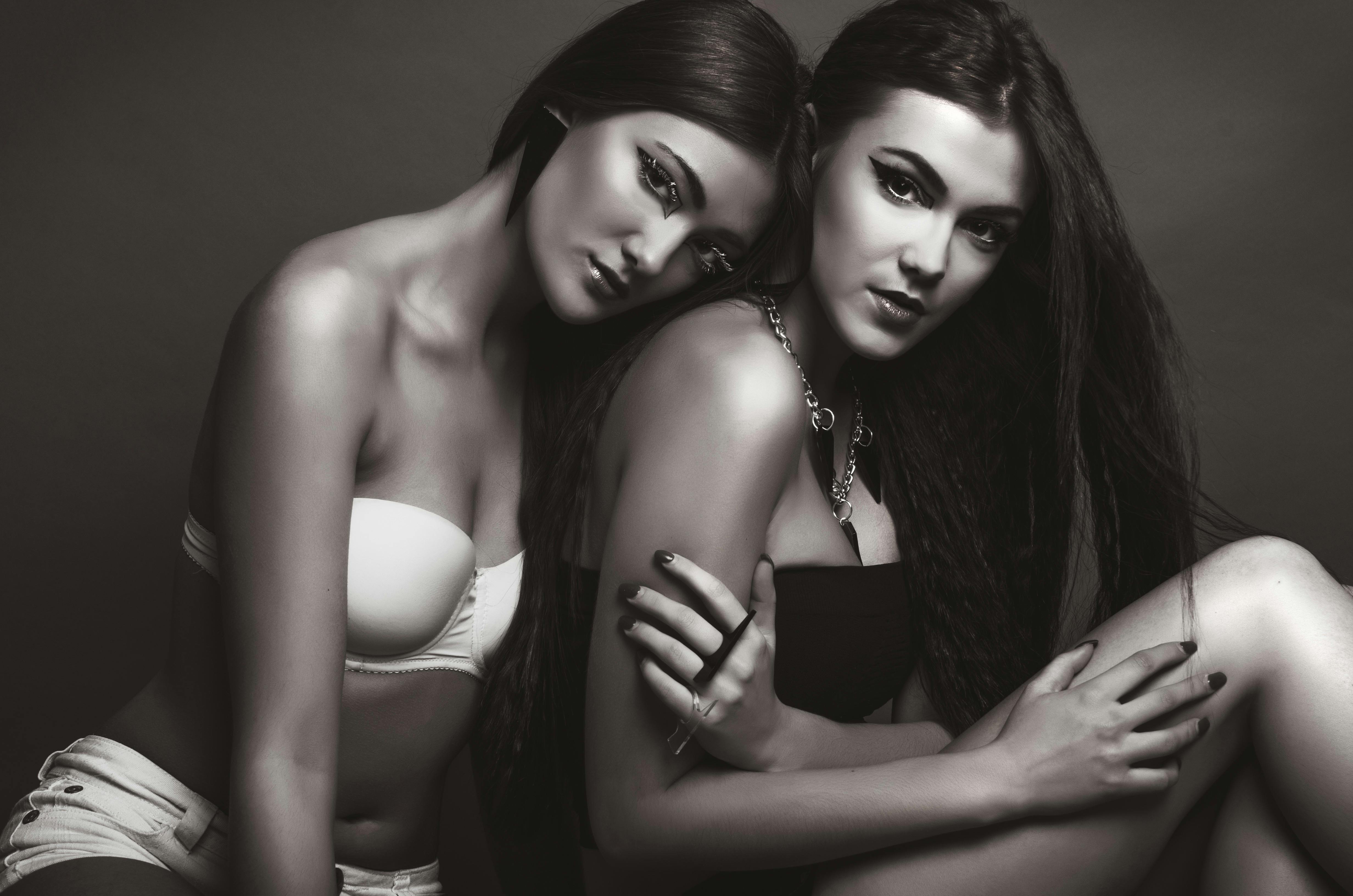 Two Woman Wearing Black and White Brassiere · Free Stock Photo