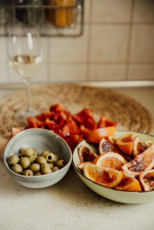 Close-Up Shot of Sliced Fruits in a Bowl