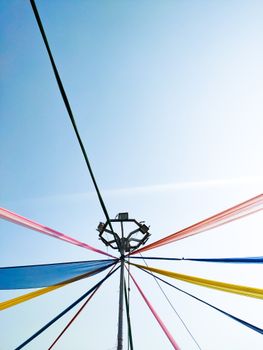 Traditional maypole with colorful ribbons