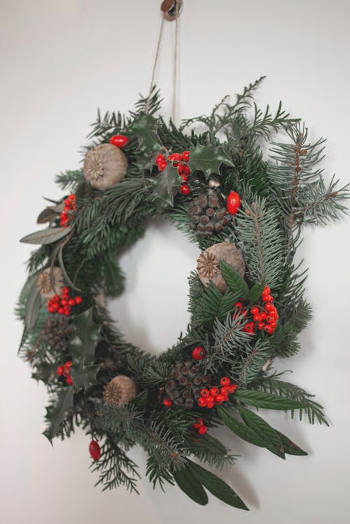 Close-Up Shot of a Christmas Wreath on the Wall