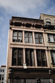 Elegant Victorian architecture of a historic building in Montreal cityscape.