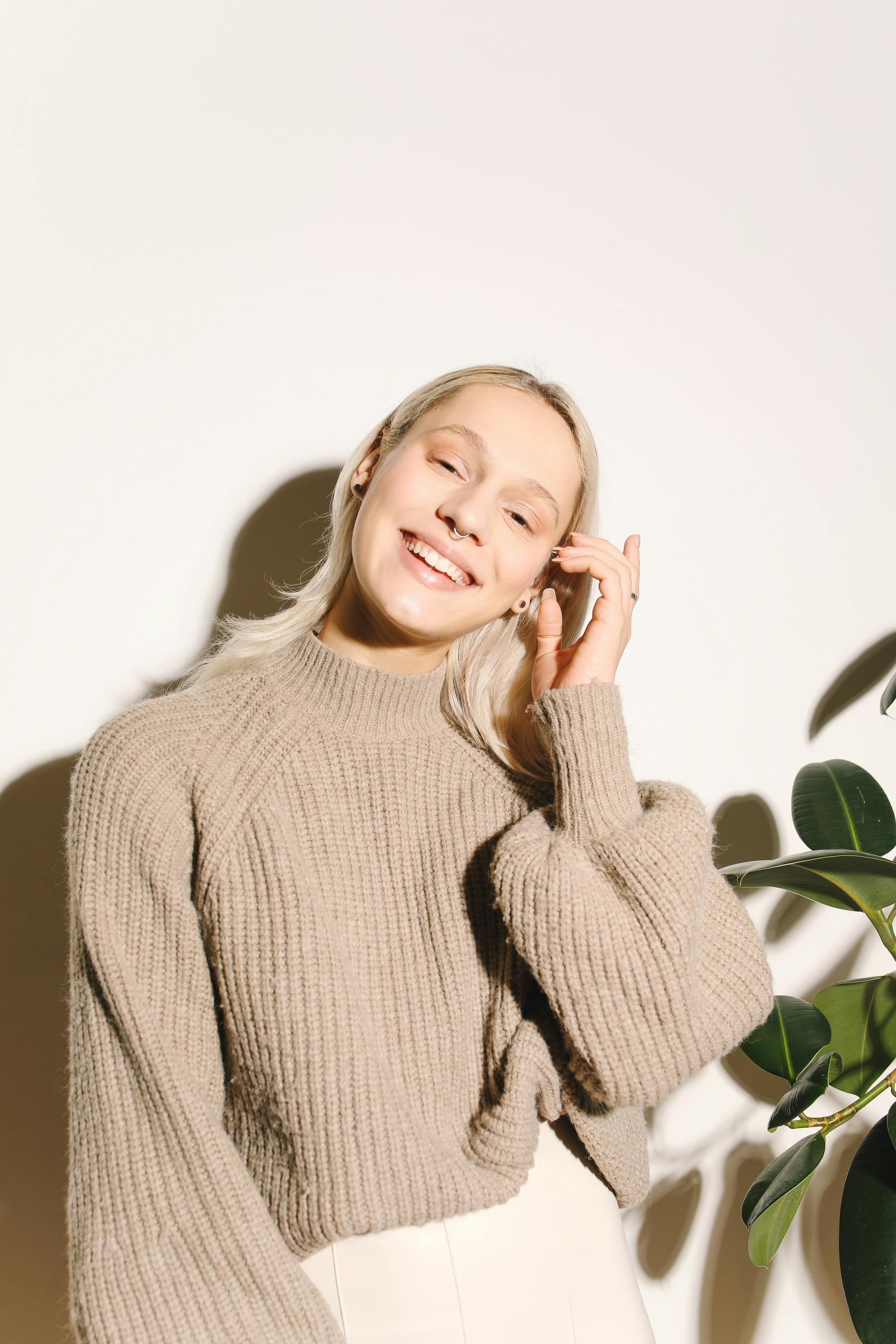 woman in gray turtleneck sweater