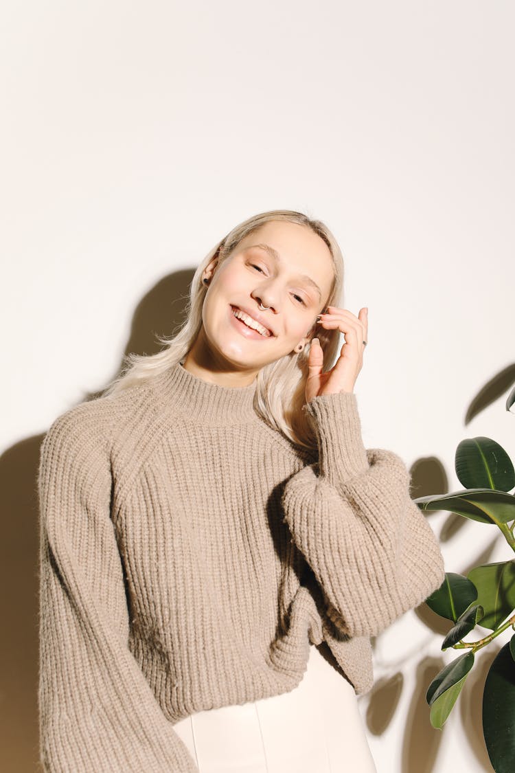 Woman In Gray Turtleneck Sweater