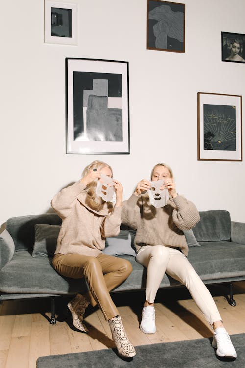 Mother And Daughter Having Fun With Masks