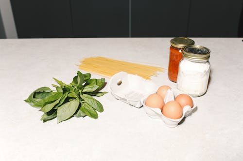 Ingredients Of A Spaghetti On Kitchen Counter