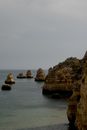 Brown Rock Formations on Body of Water