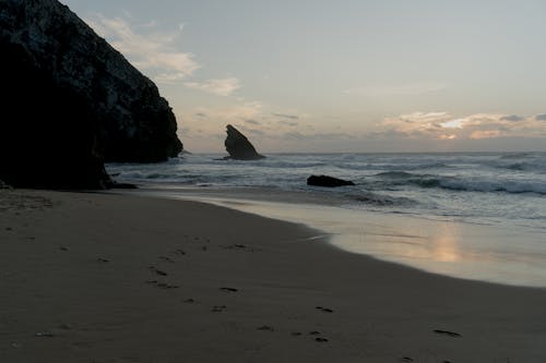 Black Rock Formation Near Sea Shore