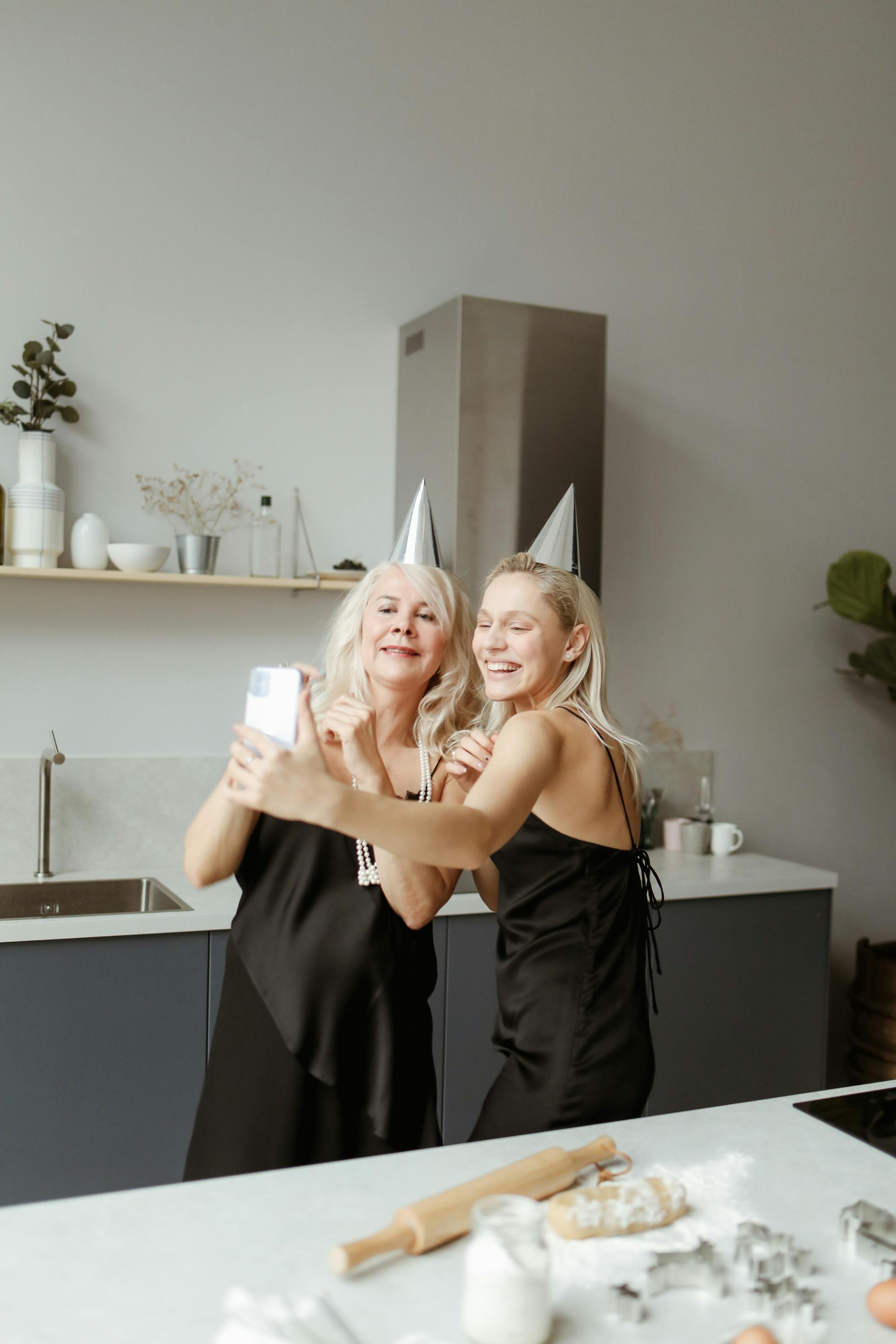 mother and daughter taking selfie