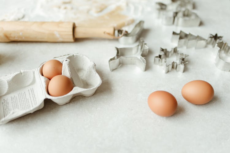 Brown Eggs And Baking Tools On Table