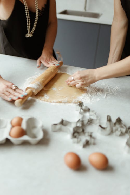 Two Women Preparing Dough For Cookies