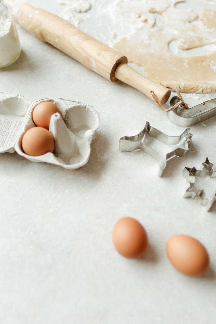 Baking Ingredients And Kitchen Tools On Table