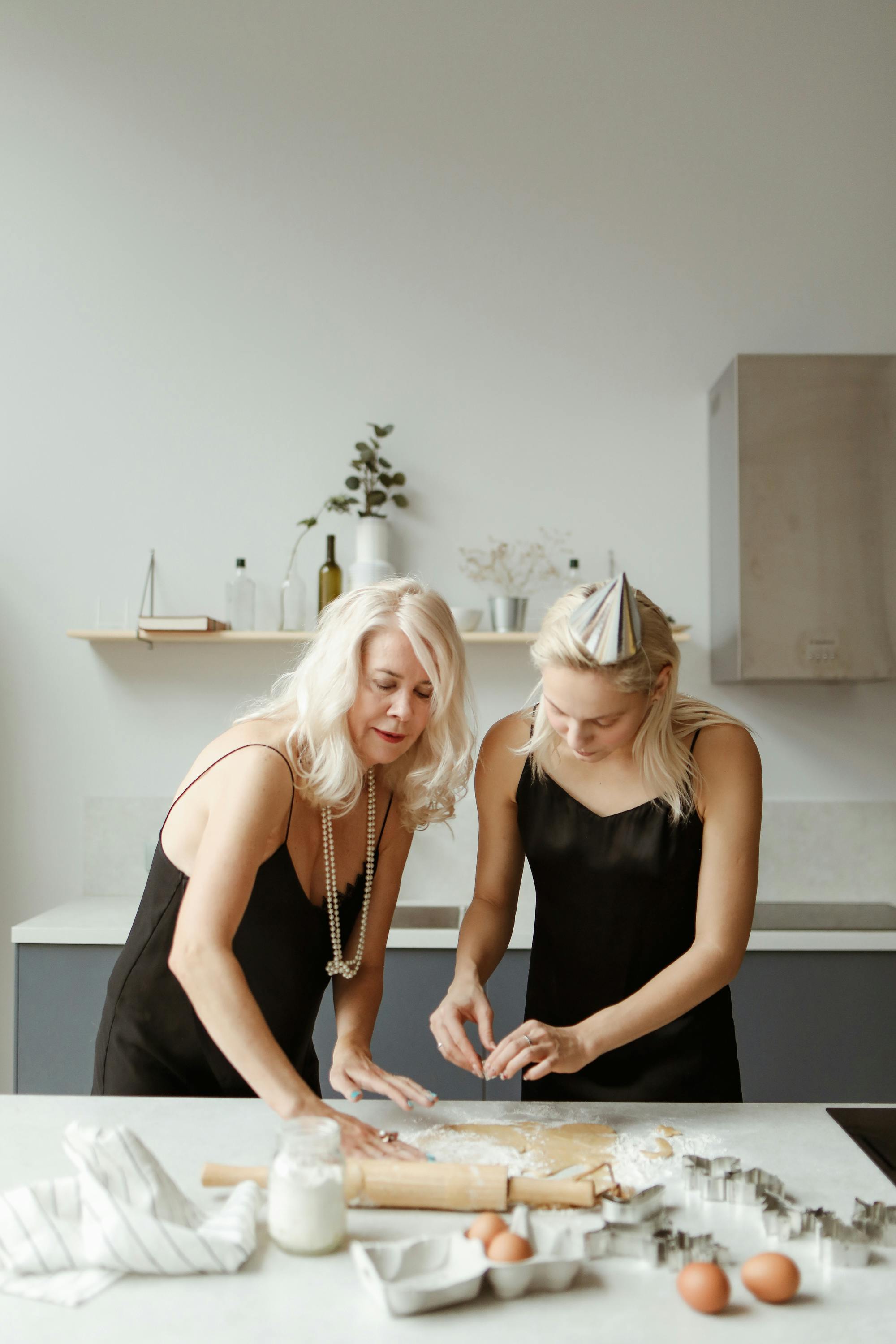 mother and daughter making cookies