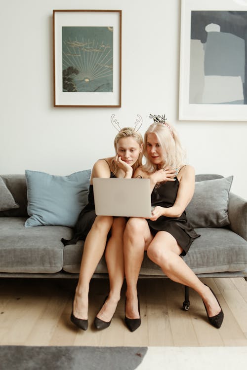 Mother And Daughter Using A Laptop