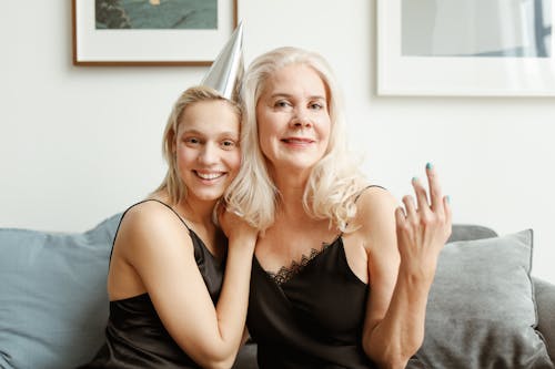 Free Mother And Daughter In Black Spaghetti Strap Top Smiling Stock Photo