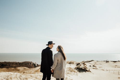 Couple Standing on the Beach
