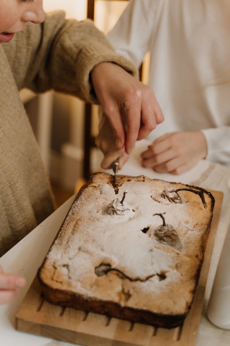 People Cutting Cake