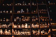 Brown Wooden Shelf With Bottles
