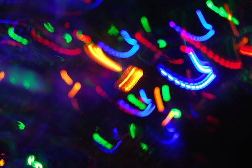 Blurred Neon Lights in a Dark Room