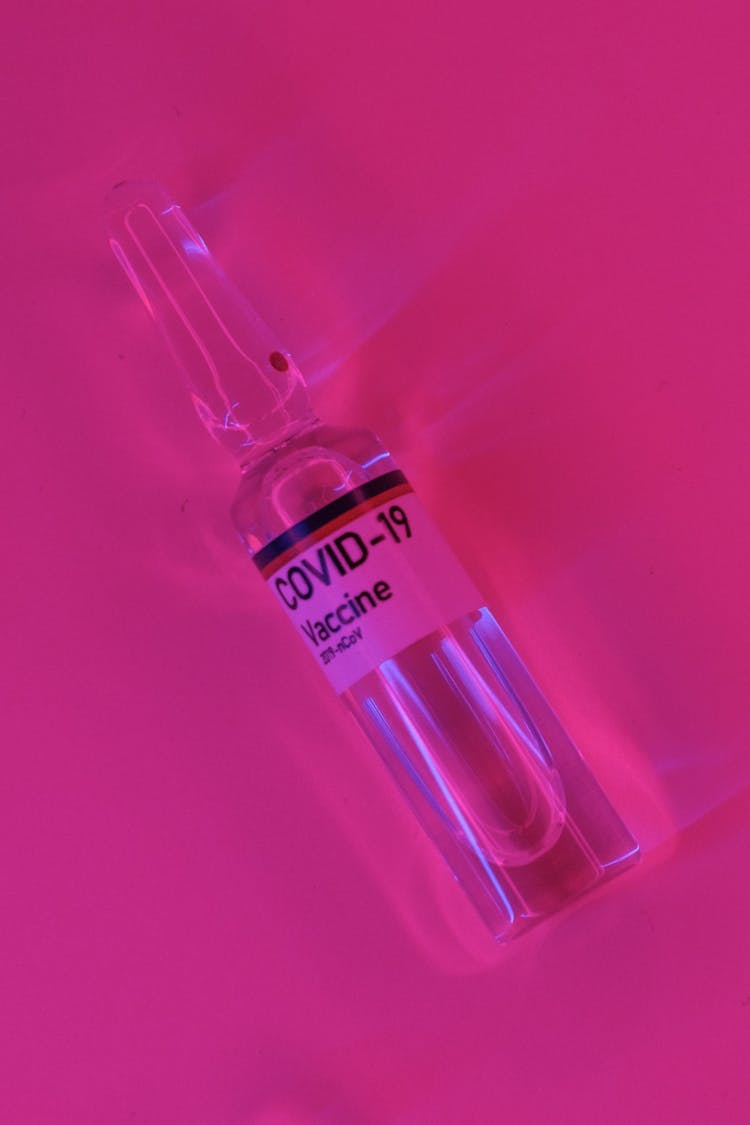 Glass Ampoule With COVID 19 Vaccine Sticker