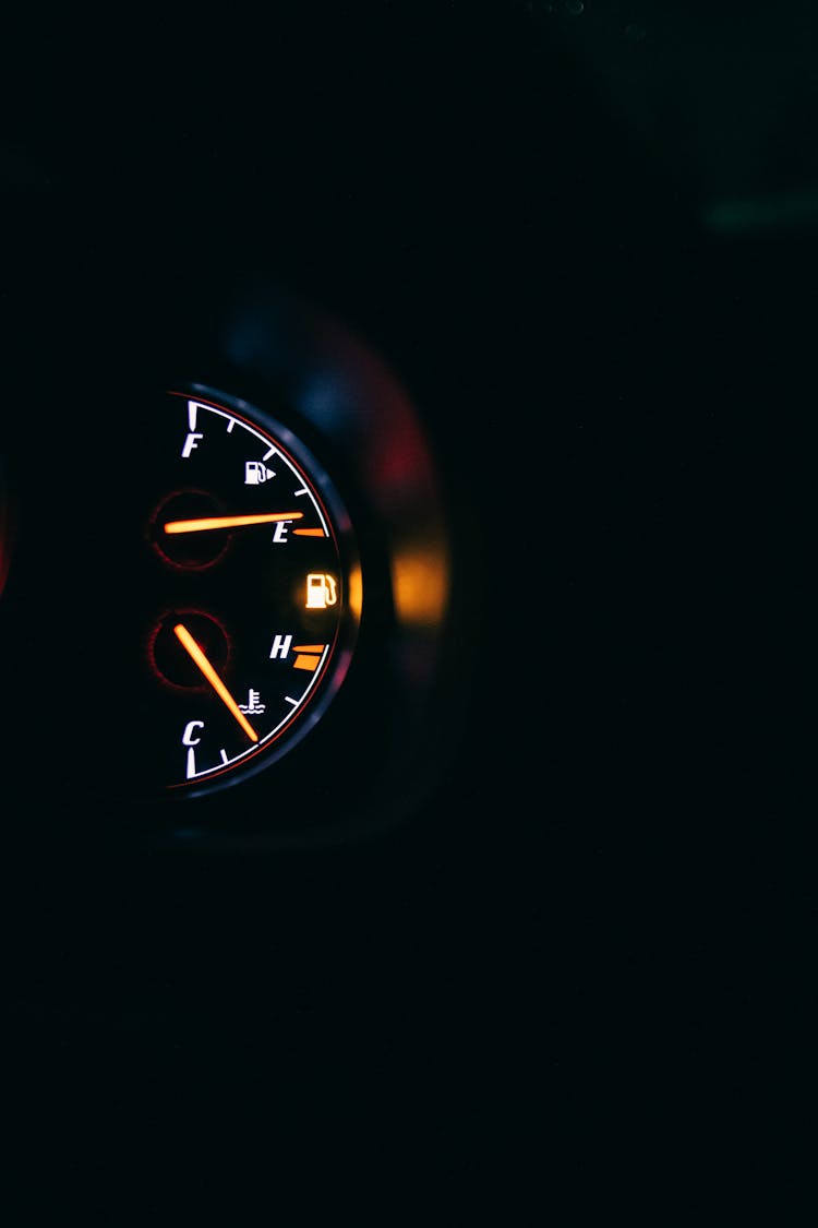 Fuel Gauge With Scale And Arrows In Car