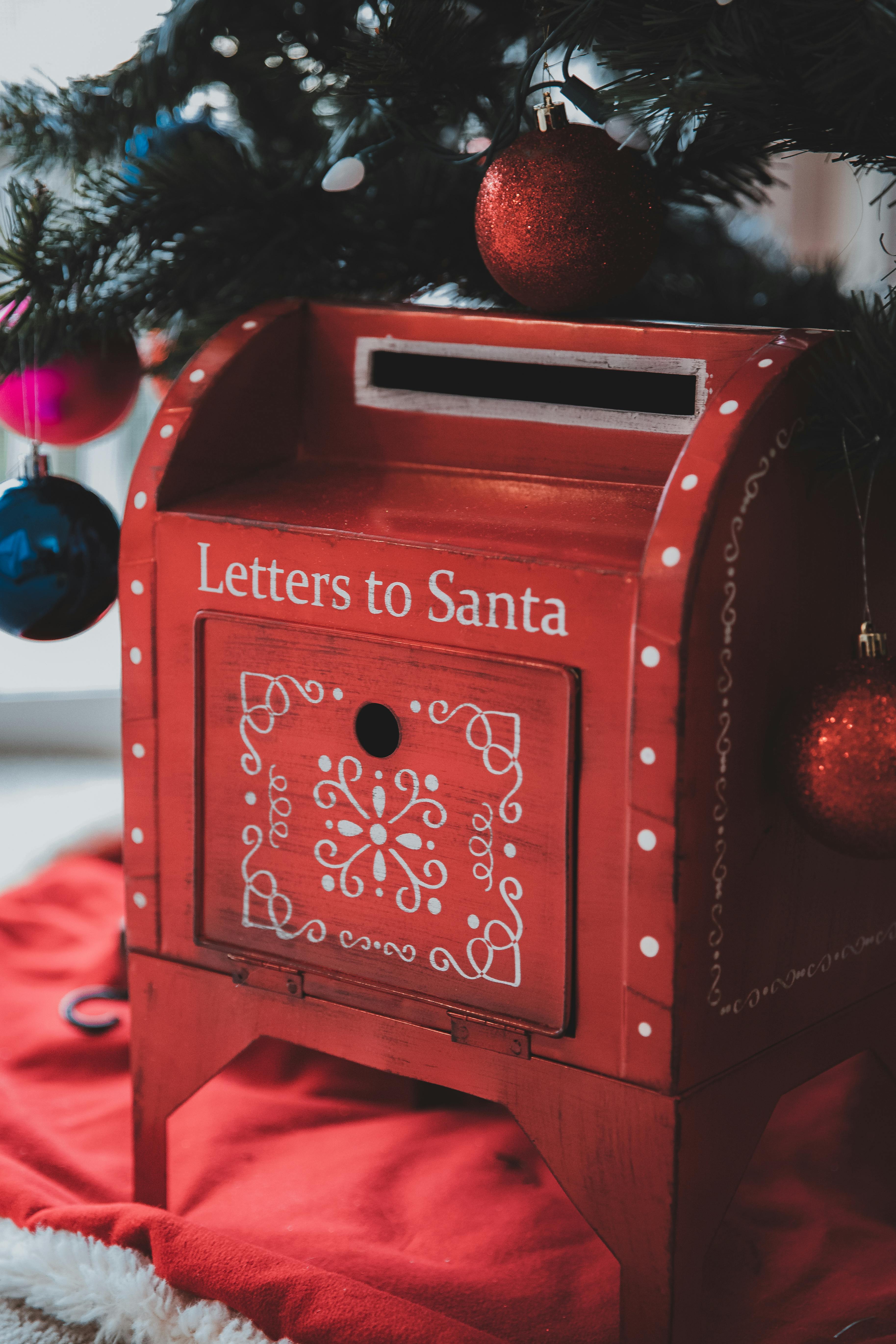 christmas decorated mailbox under tree