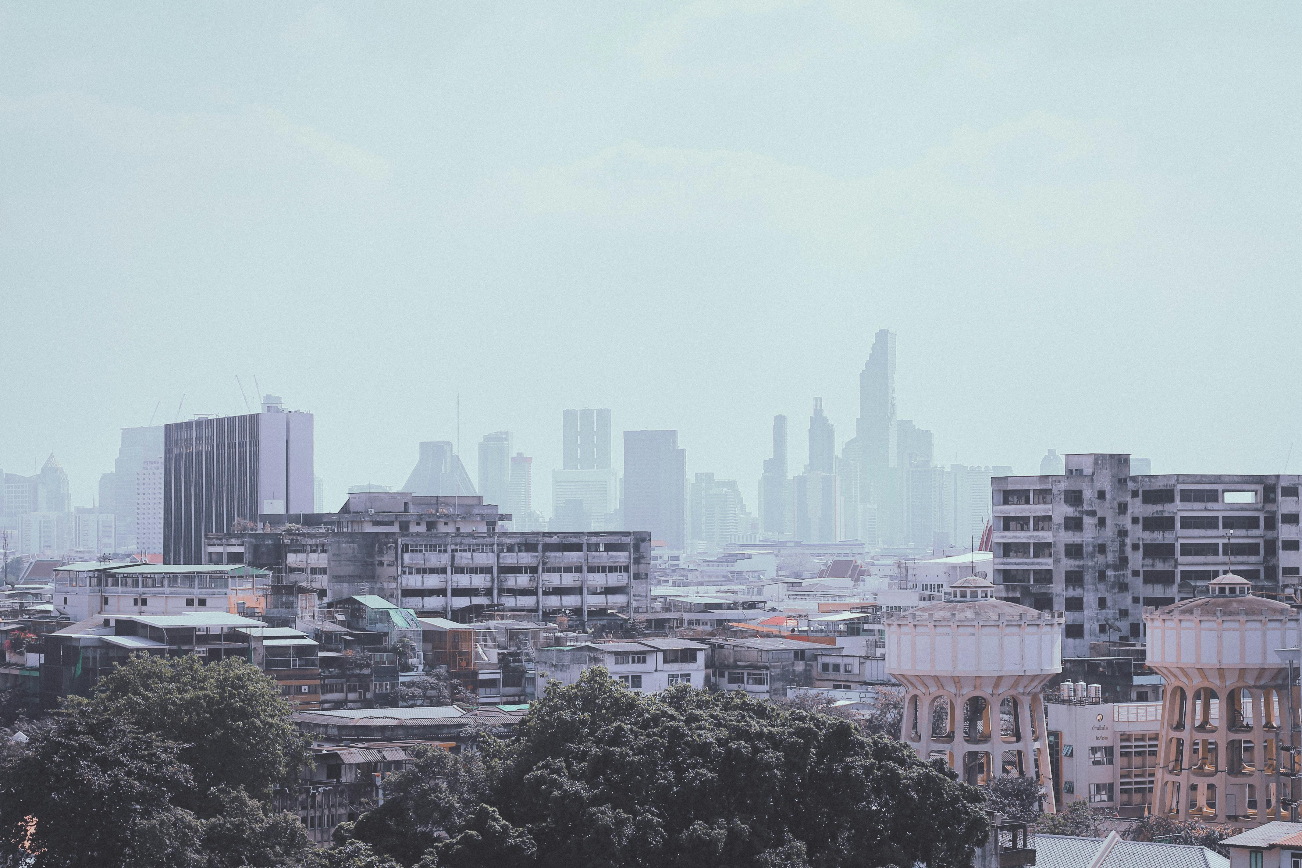 An Aerial Shot Of A City With Tall Buildings · Free Stock Photo