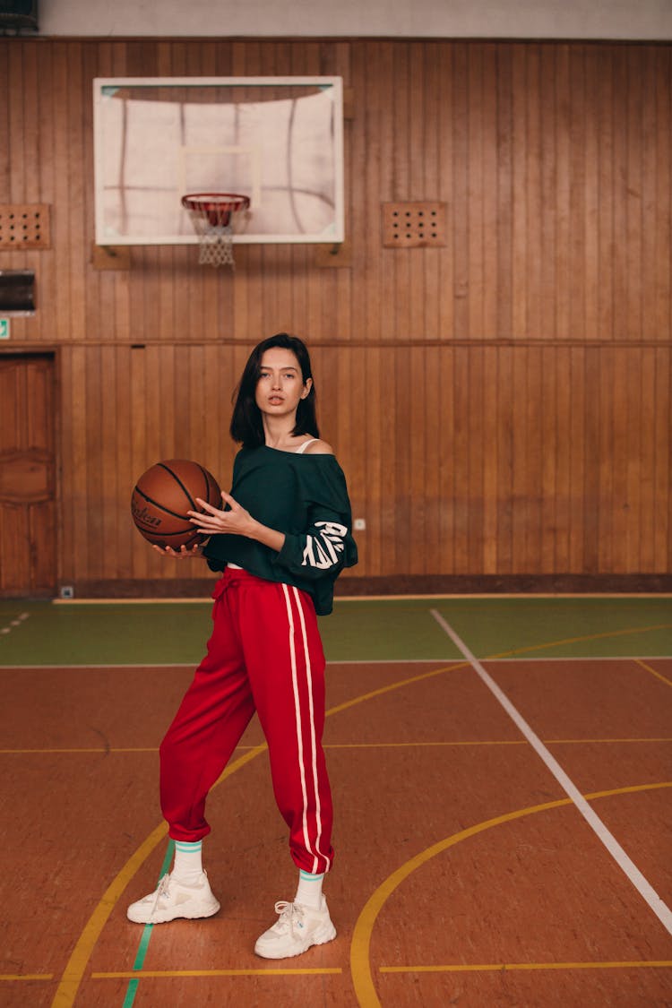 A Woman Playing Basketball