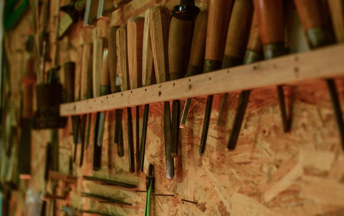 Finding an appliance's model and serial number A collection of chisels and wood carving tools organized in a workshop setting