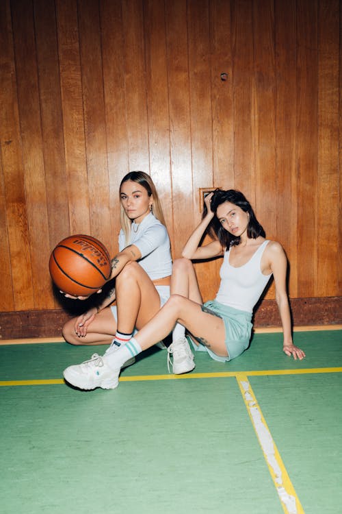 Young Beautiful Women Posing with Ball