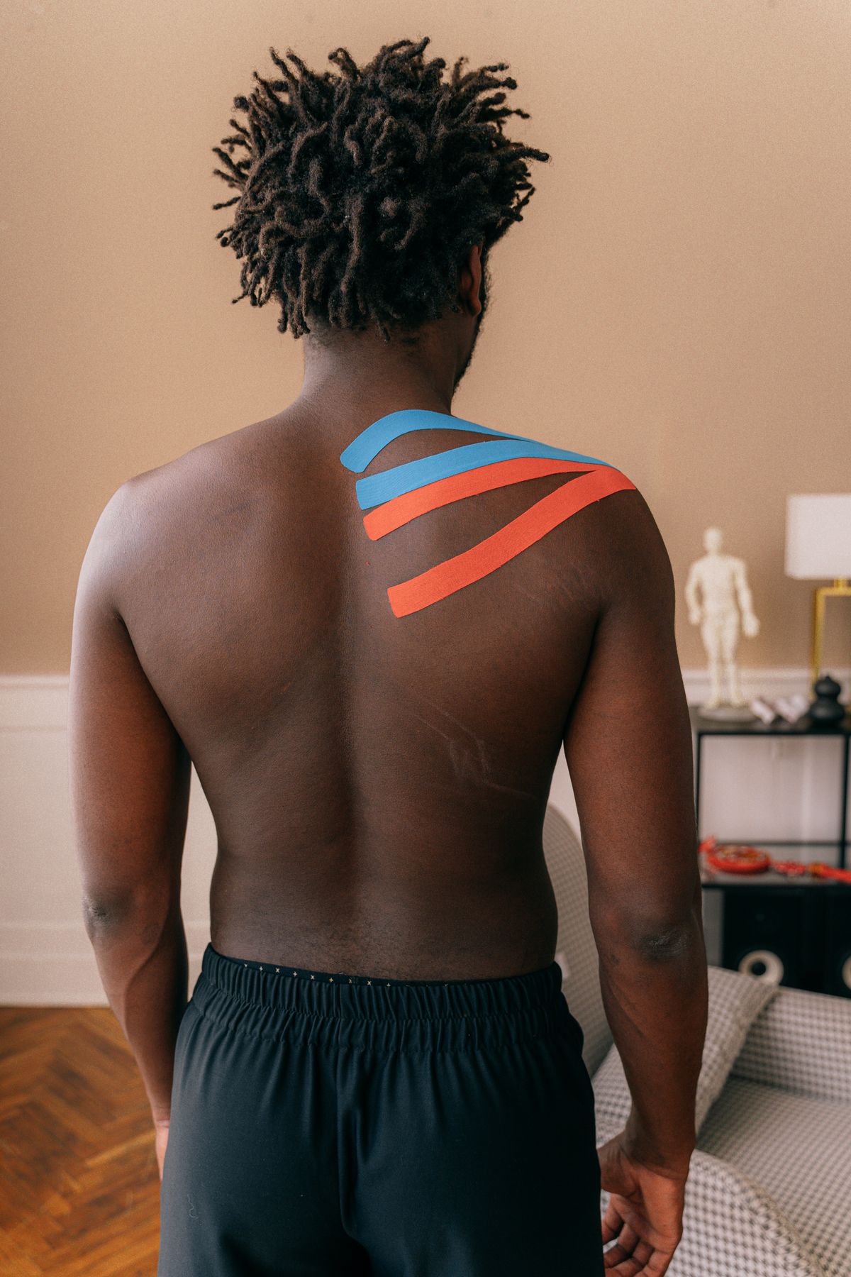 Athlete receiving muscle recovery treatment