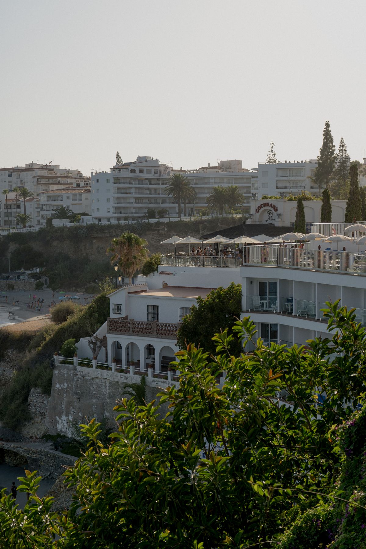 White coastal buildings and terraces in Nerja