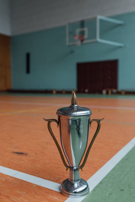 tennis championship trophy on court