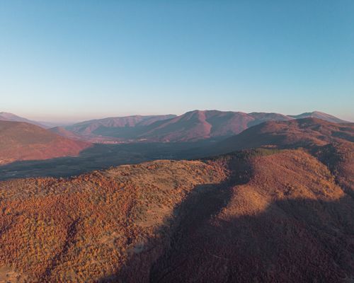 Free Stunning aerial view of the autumnal mountains in Manastirsko Dolenci, North Macedonia. Stock Photo