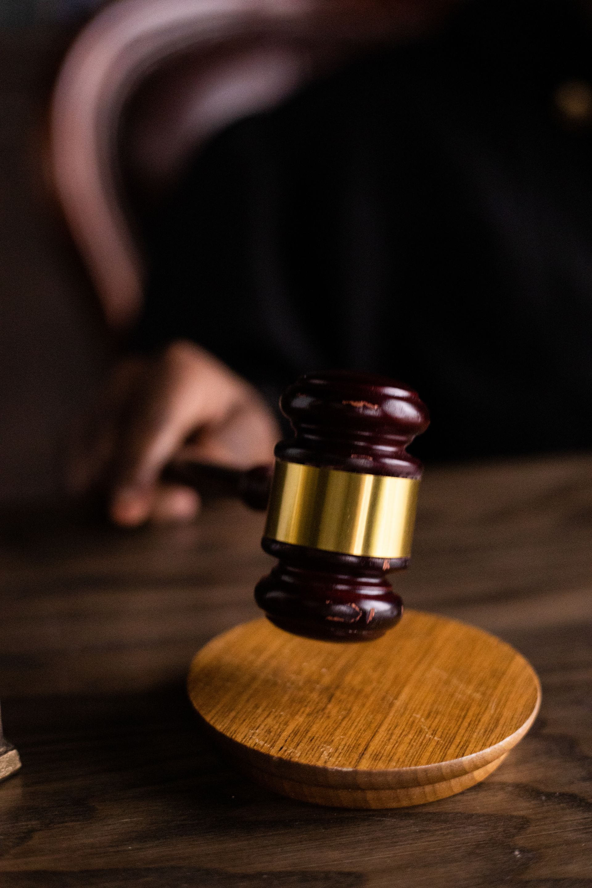 A gavel on the block in the empty courtroom