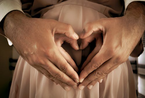 Human Hands in Close Up Photography\