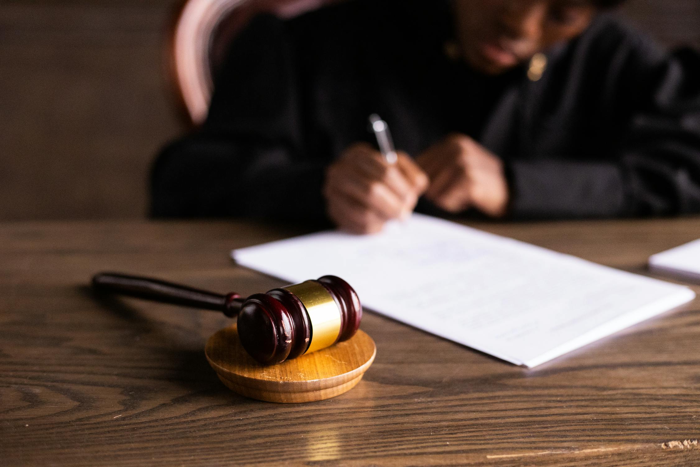 A judge writing a verdict