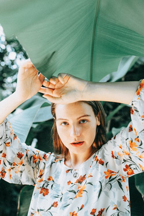 A Woman Wearing a Floral Top