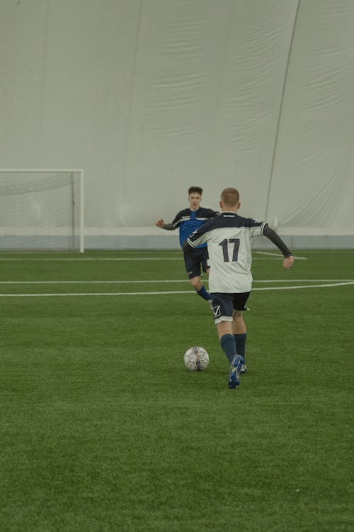 Men Playing Soccer