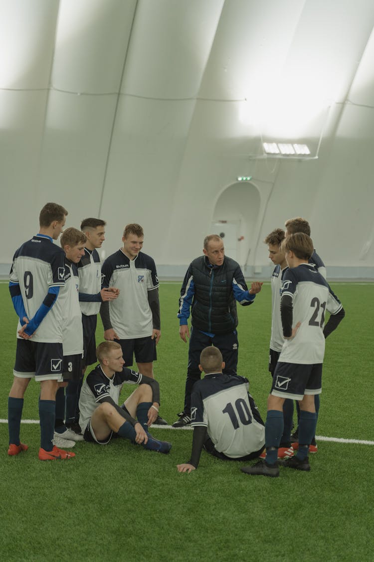 A Coach Talking To His Team