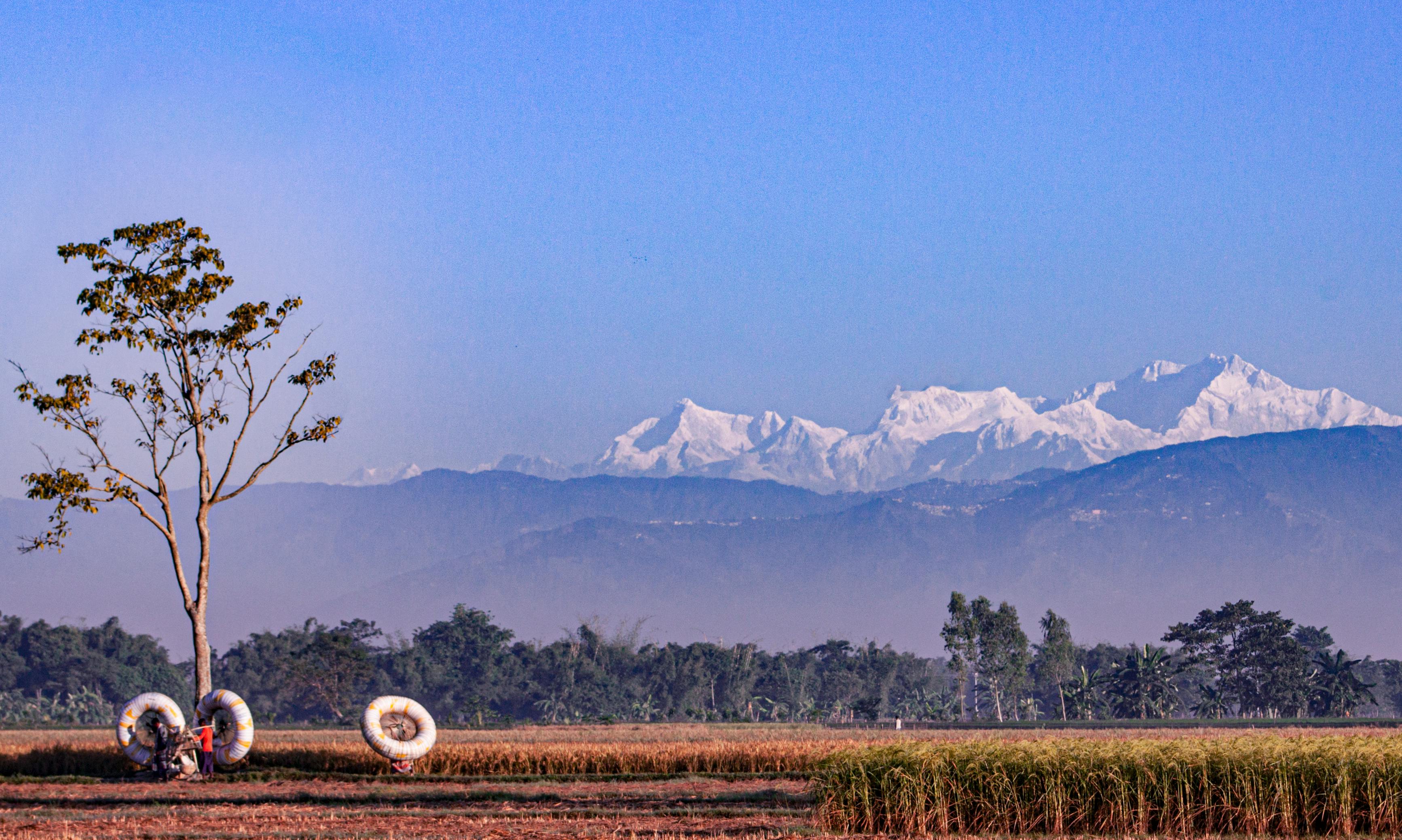 Beautiful view of Kanchenjunga mountain range with first daylight on it, at  the background, moring light, at Sikkim, India Stock Photo - Alamy