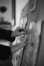 Person Holding a Wooden Board